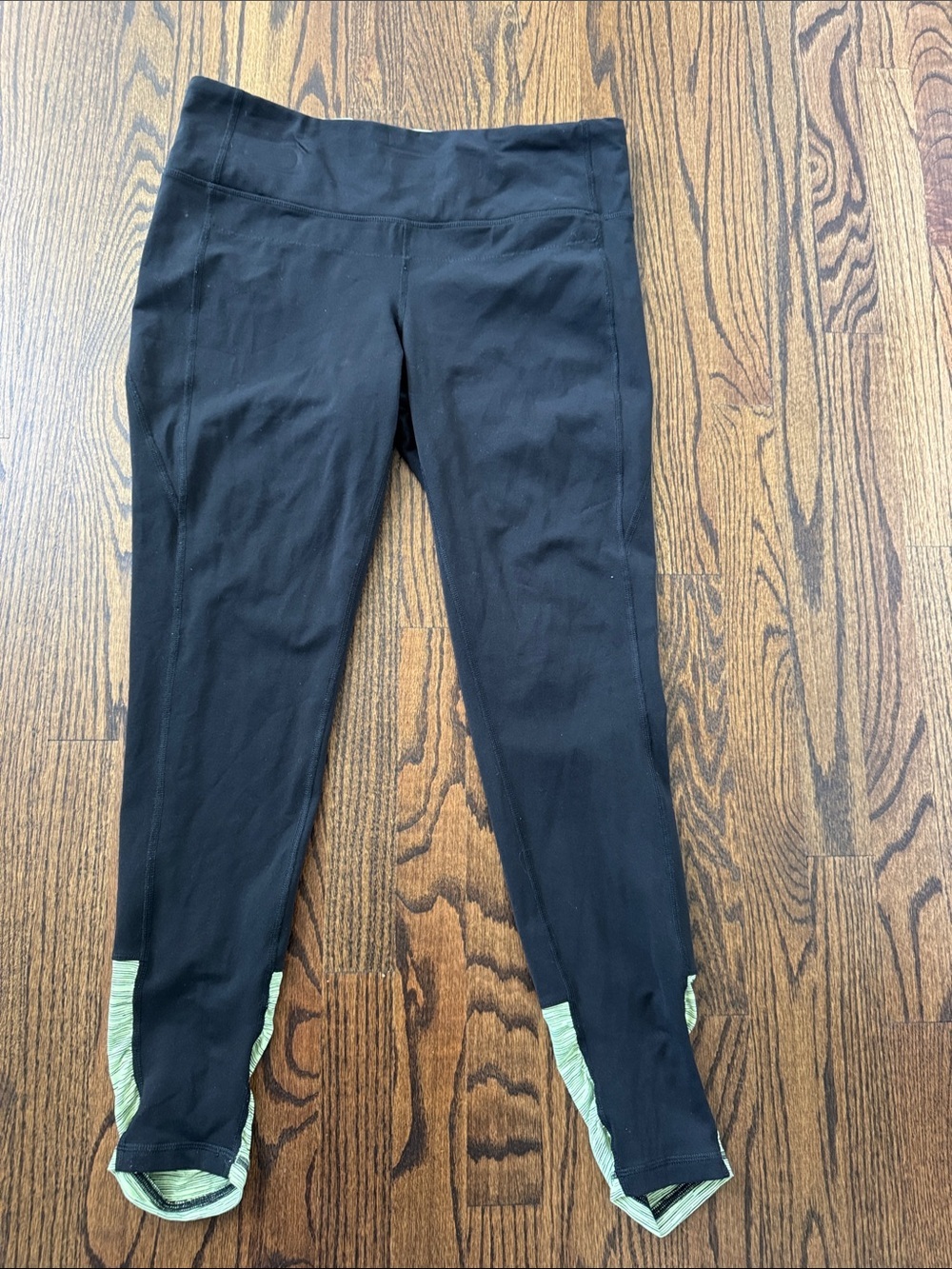 Lucy black leggings with green accents size XL .  Perfect core collection